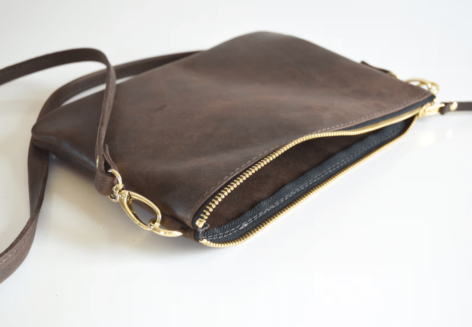Kinnoti's Black Genuine Leather Sling Bag For Women With Adjustable Brass Chain & Shoulder Pad
