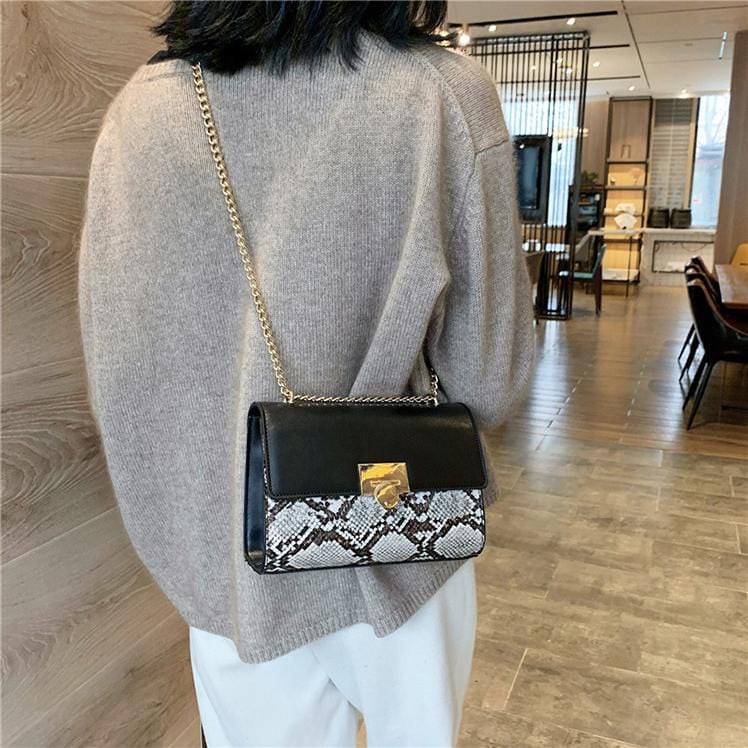 kinnoti White Snake Flap Sling Bag