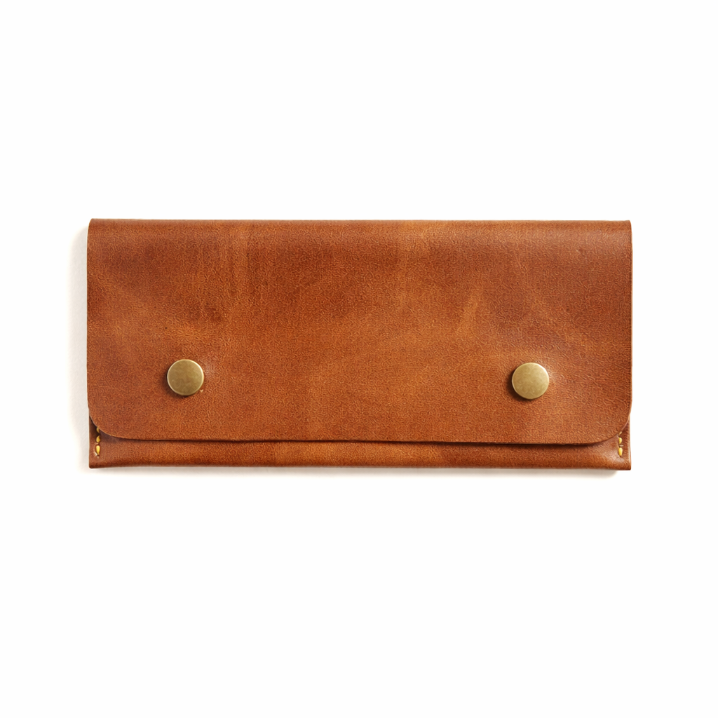 Brown leather wallet with gold buttons on a white background
